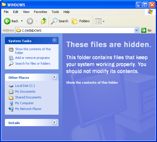 Windows Explorer displaying a “These files are hidden” message when opening a system folder